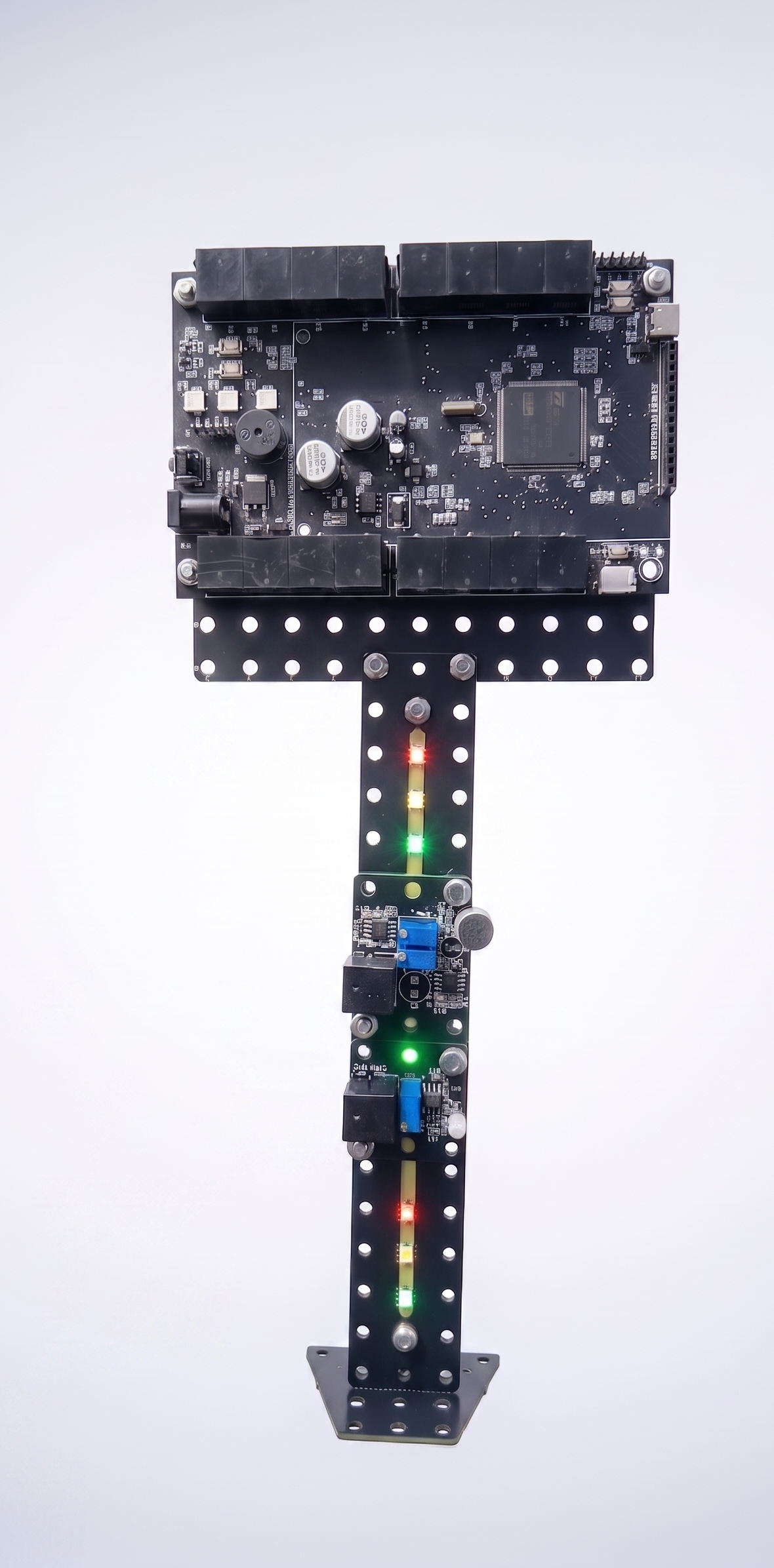 The Curio One mainboard held in hand with a live LED module chain